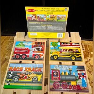 Melissa & Doug 4-twelve piece wooden puzzles in a  box “”vehicles”